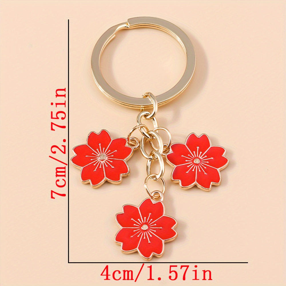 Chic Sakura Cherry Blossom Keychain - Fashionable Zinc Alloy Flower Charm for Handbags & Keys, Perfect Valentine's Gift for Her, Available in Multiple Colors