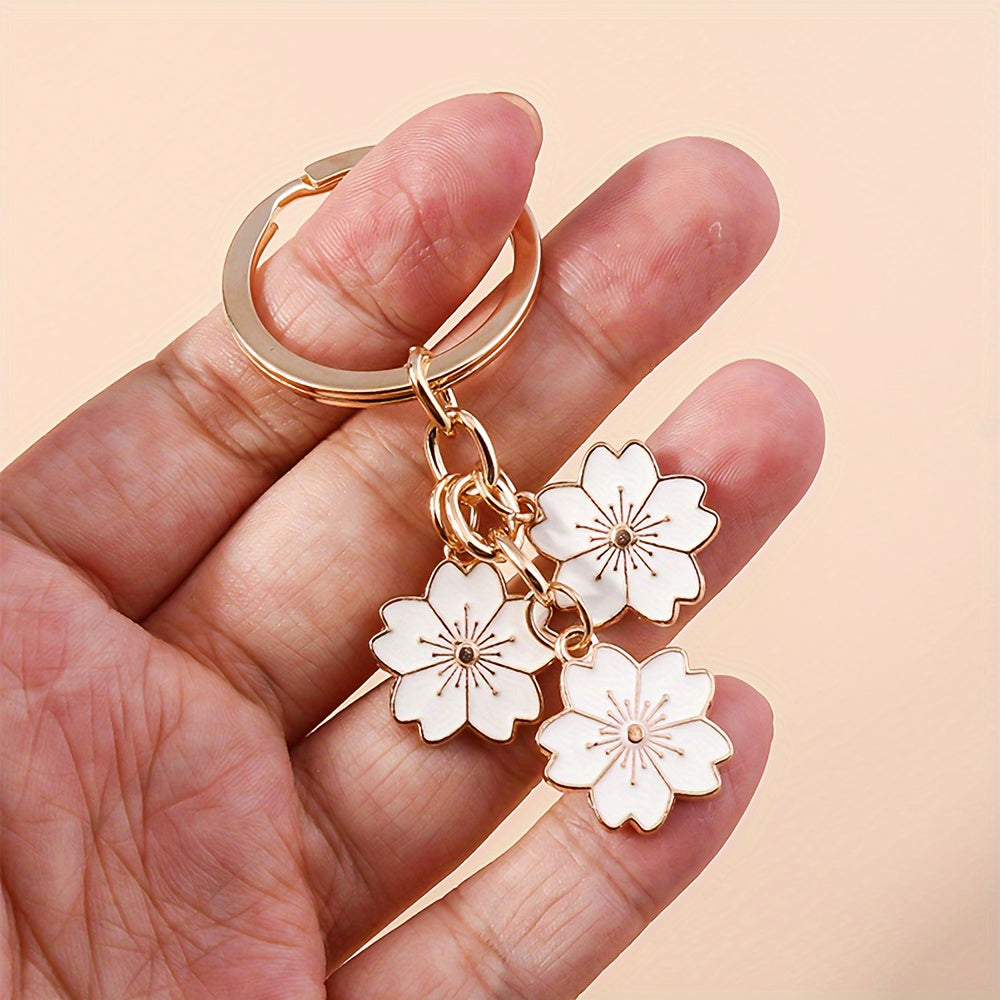 Chic Sakura Cherry Blossom Keychain - Fashionable Zinc Alloy Flower Charm for Handbags & Keys, Perfect Valentine's Gift for Her, Available in Multiple Colors