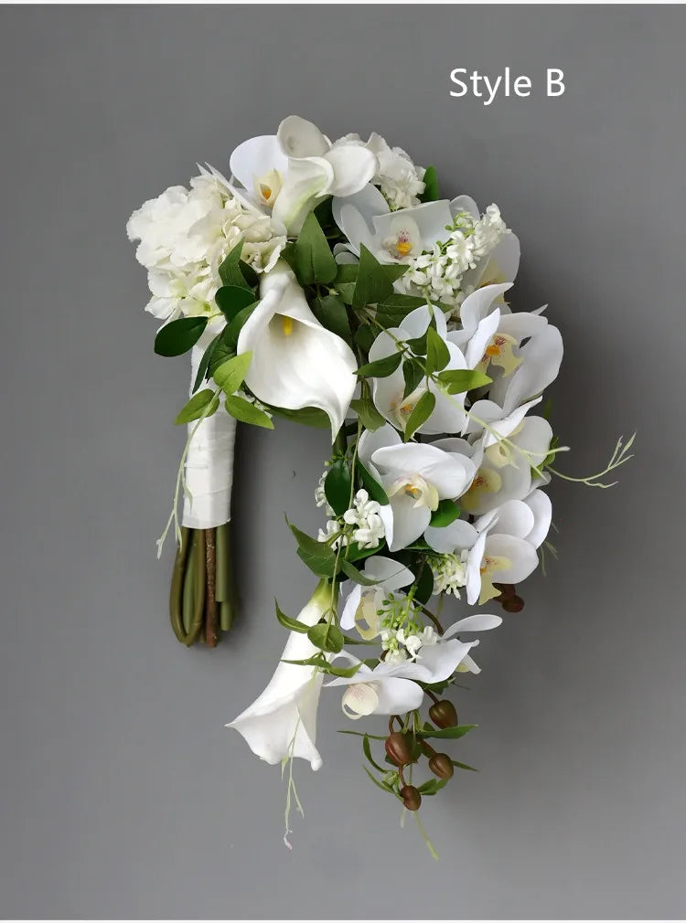 white  calla bridallilies holding flowers wedding bride holding flower calla lilies roses water drops holding bouquet