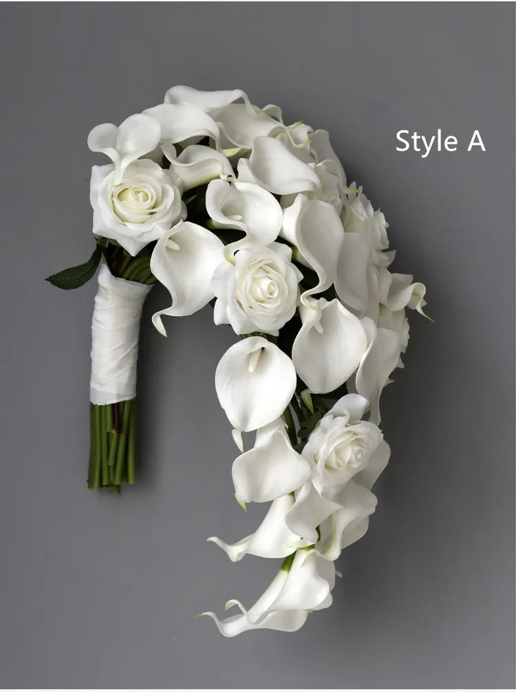 white  calla bridallilies holding flowers wedding bride holding flower calla lilies roses water drops holding bouquet