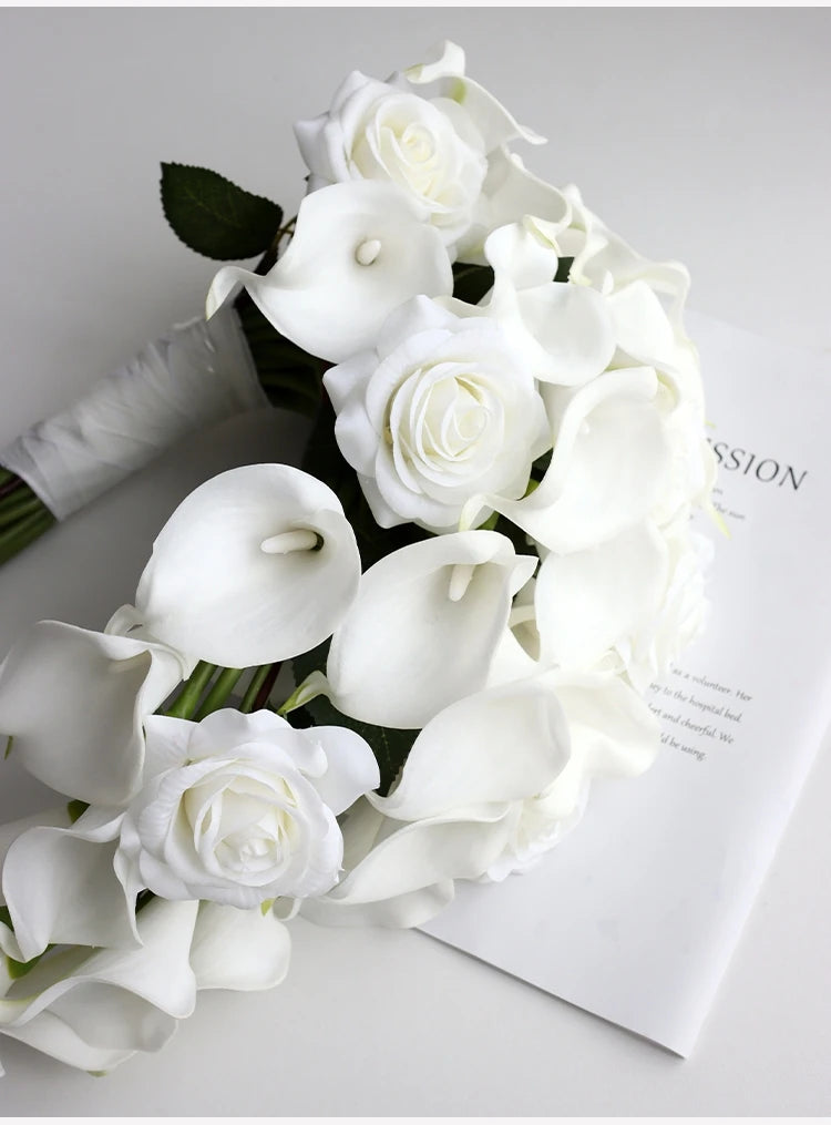 white  calla bridallilies holding flowers wedding bride holding flower calla lilies roses water drops holding bouquet