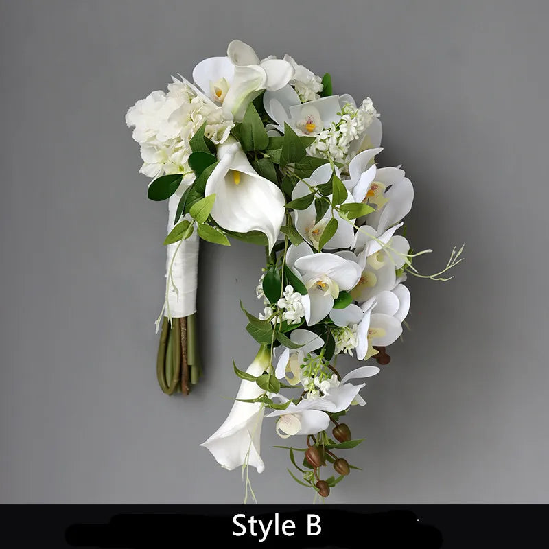 white  calla bridallilies holding flowers wedding bride holding flower calla lilies roses water drops holding bouquet