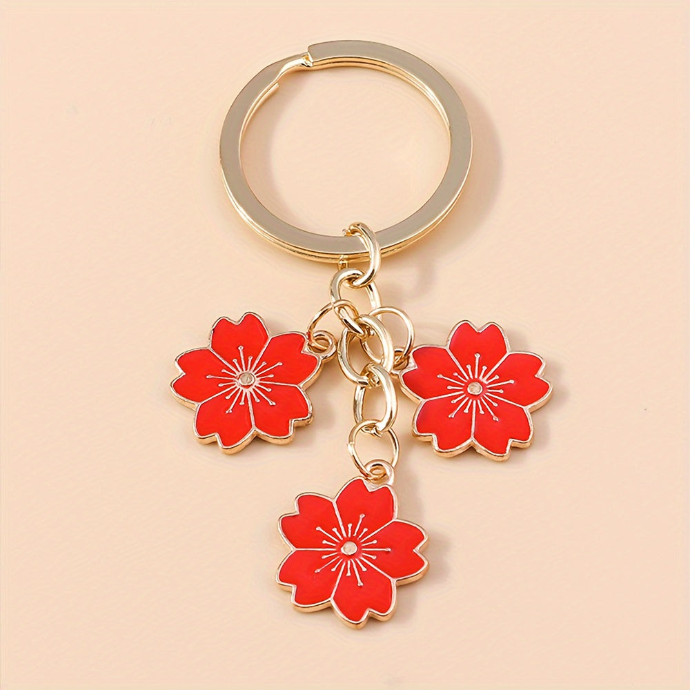 Chic Sakura Cherry Blossom Keychain - Fashionable Zinc Alloy Flower Charm for Handbags & Keys, Perfect Valentine's Gift for Her, Available in Multiple Colors