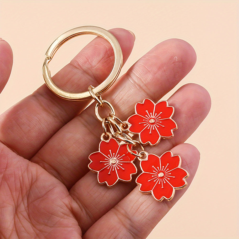 Chic Sakura Cherry Blossom Keychain - Fashionable Zinc Alloy Flower Charm for Handbags & Keys, Perfect Valentine's Gift for Her, Available in Multiple Colors