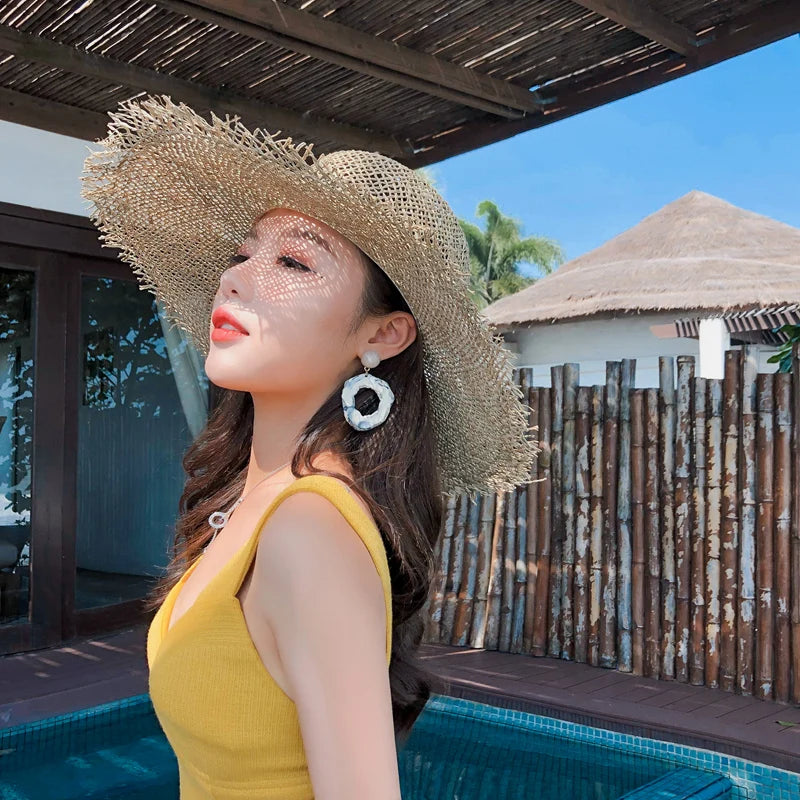 Summer hats for women Retro flat hat brim hand-made Hollow design raffia straw hat ladies outdoor sun protection beach straw hat
