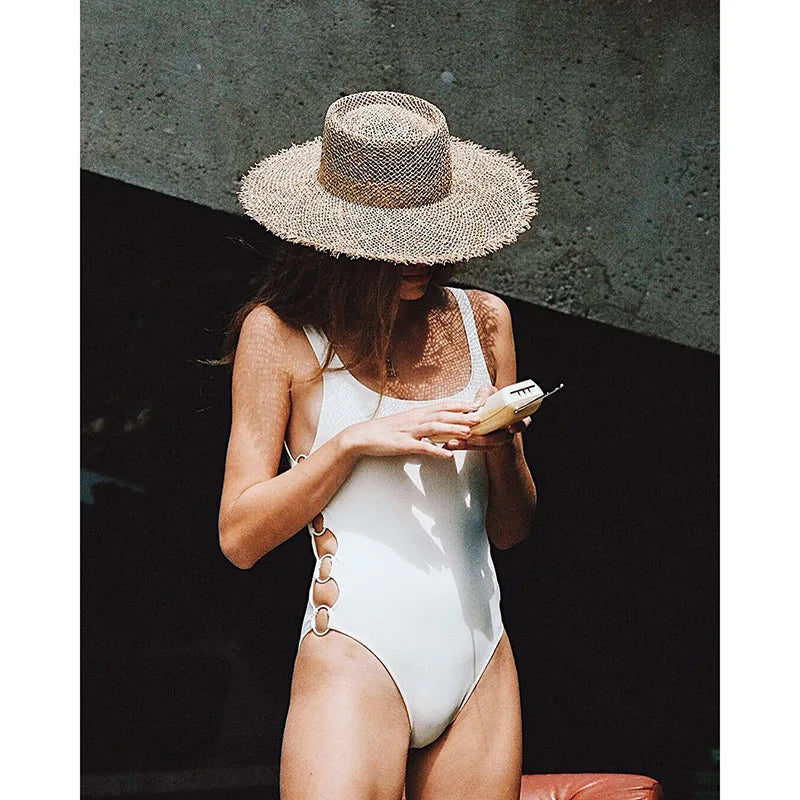 Summer hats for women Retro flat hat brim hand-made Hollow design raffia straw hat ladies outdoor sun protection beach straw hat